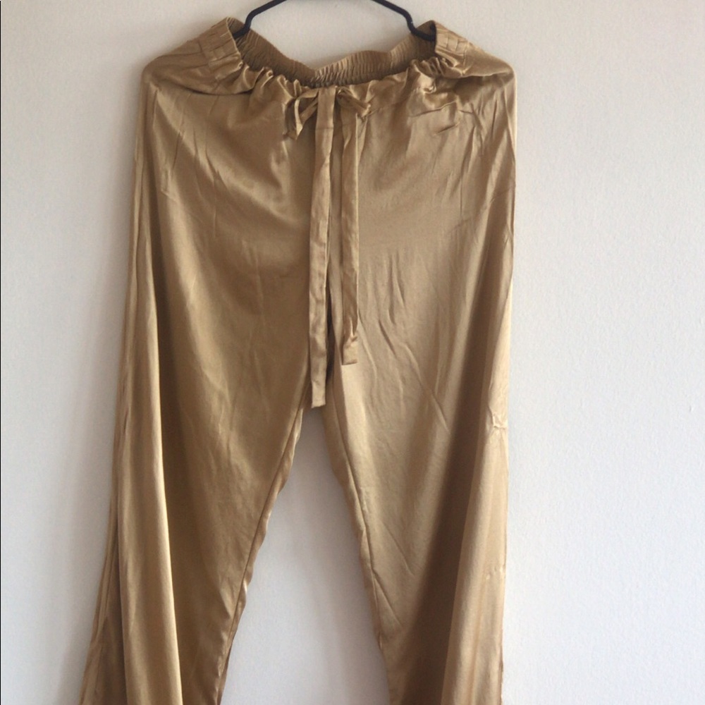 Reformation silk pajama pants in gold